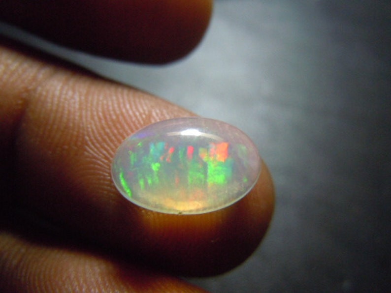 AAA etiopisk opal cabochon 9 x 11 mm oval – prålig naturlig Welo-opal ädelsten för ringinfattning bild 5