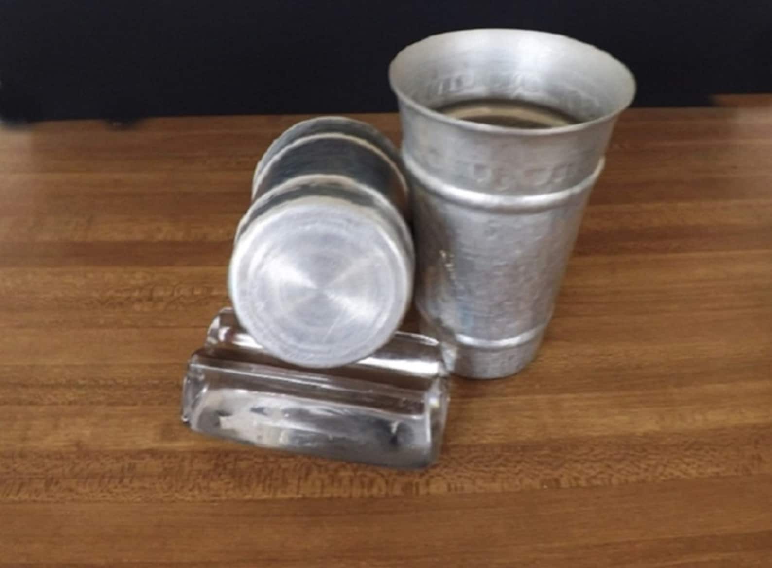 old metal drinking glasses