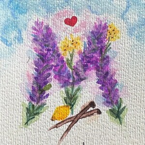 May include: Watercolour painting of the letter "M" formed by purple lavender and yellow flowers, with a red heart above. The word "moochie" is written below the flowers, with a small heart. The background is light blue.