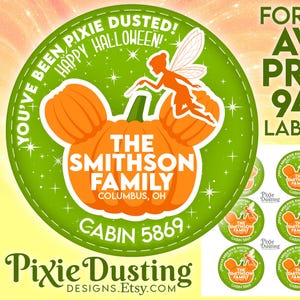 May include: Circular green and orange Halloween labels with a pumpkin design and the text "The Smithson Family, Columbus, OH, Cabin 5869". The labels also feature a fairy and the words "You've Been Pixie Dusted! Happy Halloween!"