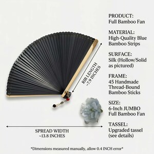 May include: Black full bamboo fan with blue bamboo strips and a silk surface. The fan has a spread width of approximately 13.8 inches and a rib length of about 7.9 inches. It features a decorative tassel and is 6 inches in size.