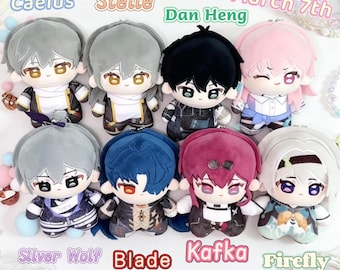May include: A collection of eight plush dolls featuring characters labelled Caelus, Stelle, Dan Heng, March 7th, Silver Wolf, Blade, Kafka, and Firefly. Each doll has a distinct hair colour, outfit, and embroidered facial features, arranged in two rows.