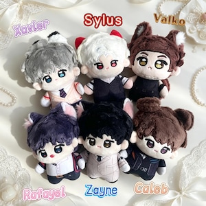 May include: Six plush dolls with embroidered facial features and soft hair textures. The dolls are labeled with the names Xavier, Sylus, Valko, Rafayel, Zayne, and Caleb. Each doll wears distinct clothing, including vests, suits, and shirts, with some featuring animal-like ears.