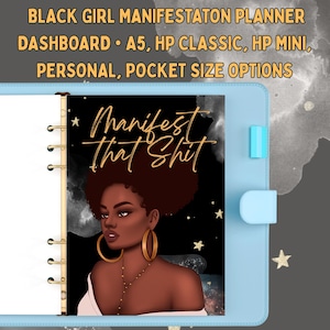 May include: A light blue ring-bound planner featuring a dashboard with an illustration of a person with dark skin and an afro, wearing gold hoop earrings. The text reads "Manifest That Shit" in gold script against a black and gray background.