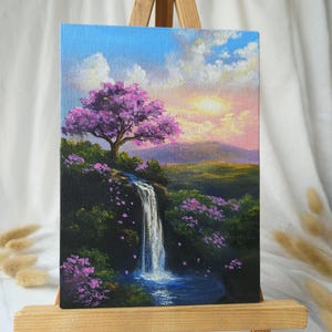 Cascada al atardecer con cerezo en flor – Pintura acrílica original sobre lienzo (13×18 cm)