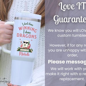 May include: A white stainless steel tumbler with a handle and straw, featuring the text "I don't chase WINNING I chase DRAGONS" above a graphic of a mahjong tile wearing sunglasses and holding a wine glass, with the name "Michelle" printed below.