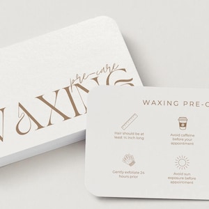 May include: A stack of white, rounded-corner cards with the word "WAXING" in large, brown letters. One card displays "WAXING PRE-CARE" instructions, including hair length, caffeine avoidance, and sun exposure precautions.