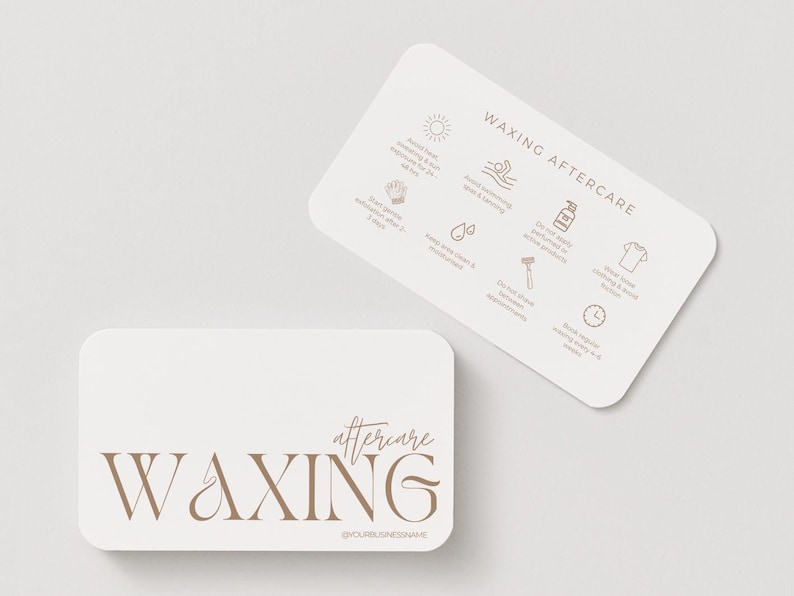 May include: Two cream-colored cards with rounded corners. One card reads "WAXING" in a serif font with "aftercare" in a script font. The other card has "WAXING AFTERCARE" text and icons with aftercare instructions.