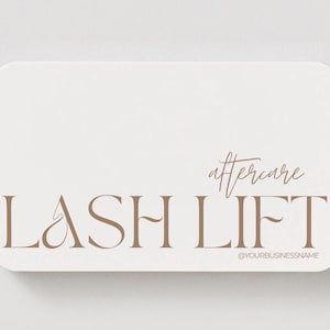May include: A rectangular business card with rounded corners. The card is off-white with the words "LASH LIFT" in a brown serif font. Above the words is the word "aftercare" in a script font. The text "@YOURBUSINESSNAME" is at the bottom.