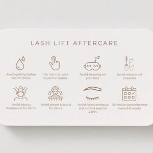 May include: A cream-colored card with rounded corners displays "LASH LIFT AFTERCARE" text and icons with instructions. The icons advise avoiding getting lashes wet, rubbing, sleeping on the face, and waterproof mascara. It also suggests avoiding beauty treatments, steam, heavy makeup, and scheduling appointments.