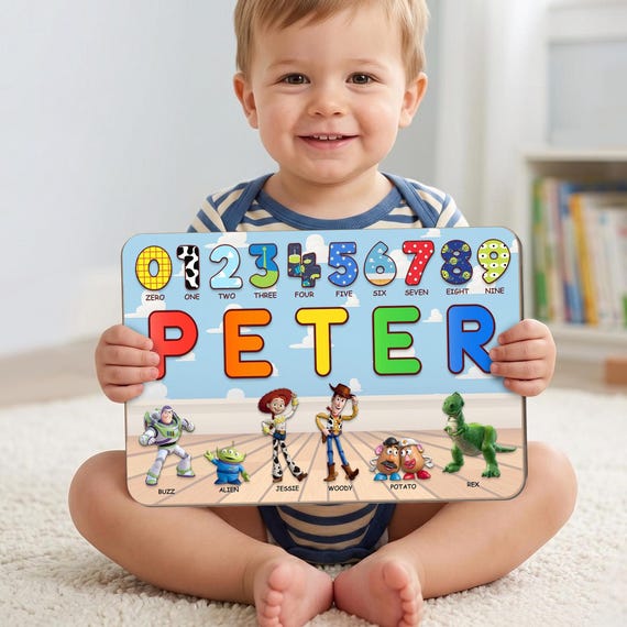 Woody and Buzz Lightyear themed wooden name puzzle that doubles as a Toy Story alphabet board — nostalgia for parents, learning tool for kids.