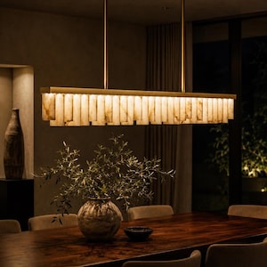 XL linear chandelier over large wood table, alabaster dining room light with luxe brass finish