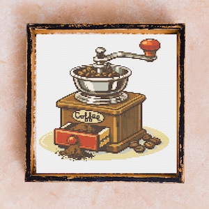 May include: Cross-stitch art of a vintage coffee grinder. The wooden grinder has a drawer open with ground coffee spilling out. The top has a silver bowl with coffee beans and a red handle. The word "Coffee" is on the front.