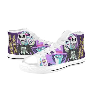 May include: White high-top trainers with a colourful design featuring characters from "The Nightmare Before Christmas." The trainers have white laces and soles, with the film's title printed on the side in purple.