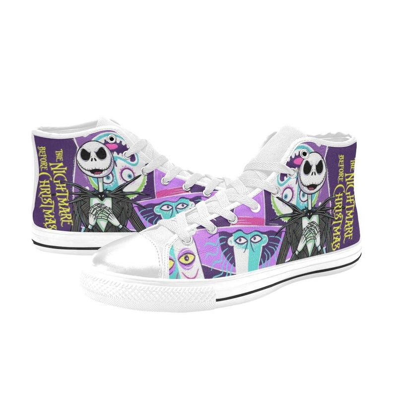 May include: White high-top trainers with a colourful design featuring characters from "The Nightmare Before Christmas." The trainers have white laces and soles, with the film's title printed on the side in purple.