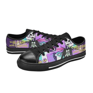 May include: A set of three ceramic canisters with lids, featuring a blue and white floral pattern. The canisters vary in size, with the largest measuring approximately 8 inches in height. They are likely used for kitchen storage.