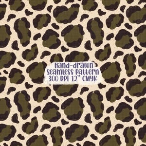 May include: A seamless pattern featuring dark olive green and black leopard spots on a light cream background. The image includes text that reads: Hand-drawn seamless pattern 300 DPI 30.48 cm CMYK. The design has a textured appearance.