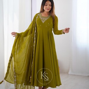 parrot green color dress Bunai Parrot Green Pompom Dress