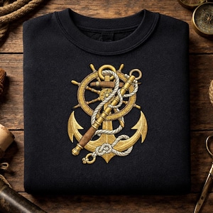 May include: Black sweatshirt featuring a gold anchor, ship's wheel, and rope design. The nautical-themed graphic includes a detailed anchor, a ship's wheel with a wooden handle, and a rope wrapped around the design. The design is centered on the front of the sweatshirt.