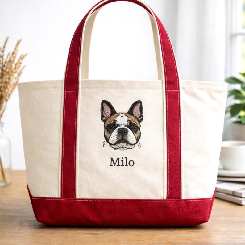 natural/Red Bags 8871 Canvas Boat Tote with a lifelike French Bulldog embroidery and the name "Milo." This personalized pet portrait bag features a classic contrast trim, making it a premium custom gift for bulldog owners and high-end embroidered merchandise.