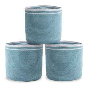 May include: Three round, woven storage baskets in a light blue color. Each basket has a white stripe near the top and a handle. The baskets are made of a thick, textured material.