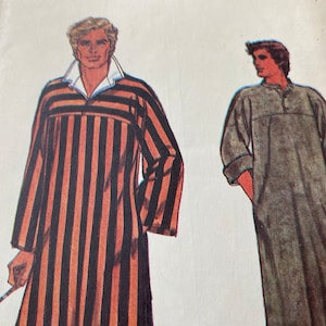 May include: Vintage sewing pattern featuring two long sleepwear designs. One sleepwear design is striped in black and orange, with a white collar. The other sleepwear design is solid gray with a mandarin collar.