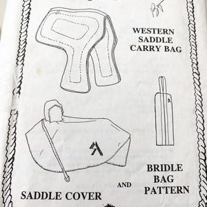 May include: A black and white line drawing of a sewing pattern for a Western saddle carry bag, saddle cover, and bridle bag. The text includes "Suit Ability #7600", "Western Saddle Carry Bag", "Saddle Cover", and "Bridle Bag Pattern".