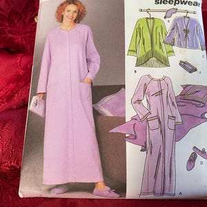 May include: A sleepwear pattern showing a long, pale purple robe with pockets, a matching clutch, and slippers. The pattern also includes illustrations of a green jacket, a purple jacket, and a pillow.
