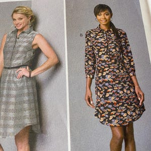 May include: Two women modeling different styles of dresses. The dress on the left is a gray and white plaid dress with a black belt. The dress on the right is a black and white floral dress. The text on the page reads "Size E5 (14-16-18-20-22)" and "Taille Taille Talla"