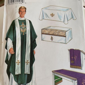 May include: Simplicity 7950 sewing pattern envelope featuring illustrations of liturgical vestments including a green chasuble with a white stole, a white altar cloth, a white box-shaped cover, and a purple lectern hanging with gold fringe.