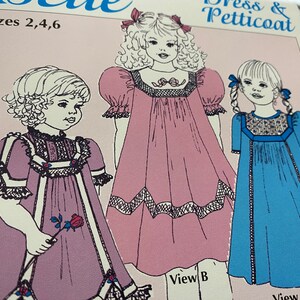 May include: A sewing pattern for a girls' dress and petticoat. The pattern includes three different views of the dress, each with a different style. The dress is available in sizes 2, 4, and 6.