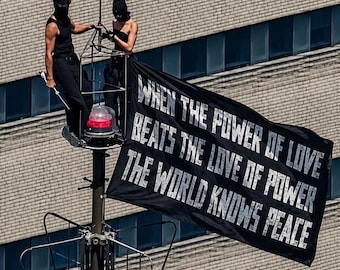 When The Power Of Love Beats The Love Of Power Flag