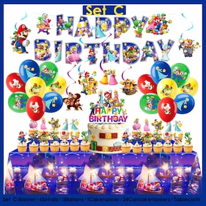 Puede incluir: Un colorido juego de decoraci&oacute;n de cumplea&ntilde;os con una pancarta que dice "Happy Birthday". El juego incluye globos, adornos para cupcakes, un adorno para pastel y un mantel, todos con dise&ntilde;os de personajes de dibujos animados.