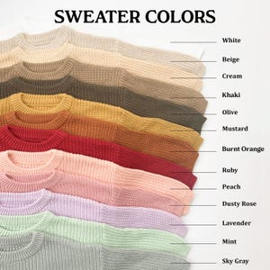 May include: An array of sweaters in a spectrum of colours: white, beige, cream, khaki, olive, mustard, burnt orange, ruby, peach, dusty rose, lavender, mint, and sky grey. The image presents the sweaters in a layered display, highlighting the diverse shades.