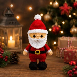 May include: A crocheted Santa Claus doll featuring a red hat with a white pom-pom, a white beard, a red suit with a black belt and yellow buckle, and black boots. The figure has a tan face with two small black eyes and is crafted from yarn.