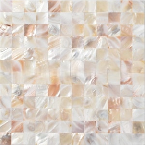 May include: A square mosaic tile pattern composed of small, iridescent, square tiles. The tiles have a pearlescent sheen with colors ranging from white and cream to soft peach and gold. The overall effect is a shimmering, textured surface.