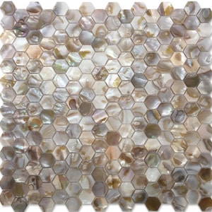 May include: A mosaic tile sheet composed of numerous hexagonal tiles. The tiles feature a pearlescent finish with a mix of neutral tones, including white, beige, and brown. The surface has a reflective quality, creating a shimmering effect.