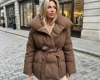 Chaqueta acolchada con cinturón para mujer: abrigo de invierno extragrande con cuello alto, chaqueta acolchada cálida y acogedora, elegante prenda para el frío.