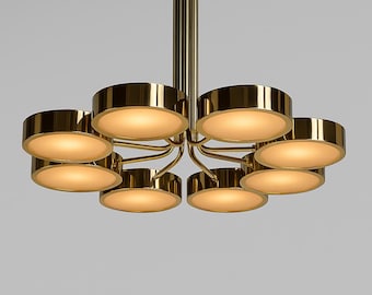 May include: A modern chandelier with a gold finish. The fixture features eight circular light fixtures arranged around a central stem. Each light has a warm, inviting glow, creating a stylish and elegant lighting solution.