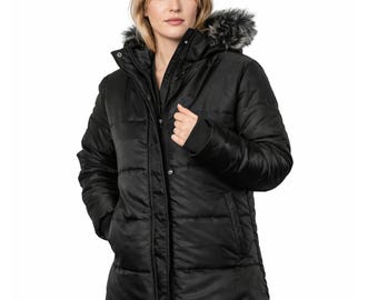 May include: Black puffer coat with a faux fur-trimmed hood. The coat features a quilted design, a zip and snap closure, and long sleeves. The model is wearing a dark sweater underneath. The coat is designed to provide warmth and protection from the elements.