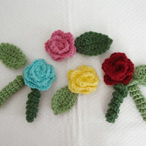 Gehäkelte Rosetten Blätter und Verschönerung Curly Q&#39;s Pattern
