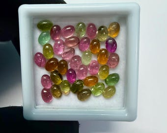 Wielokolorowy kaboszon z turmalinu, owalny kamień szlachetny (6 x 4 mm)