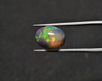 2.60 Carat Black Ethiopian Opal Oval Cabochon 11.5X9MM