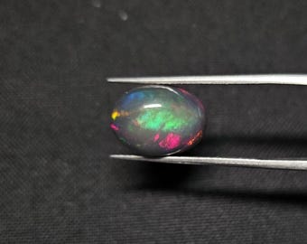 3.35 Carat Black Ethiopian Opal Oval Cabochon 13X10MM