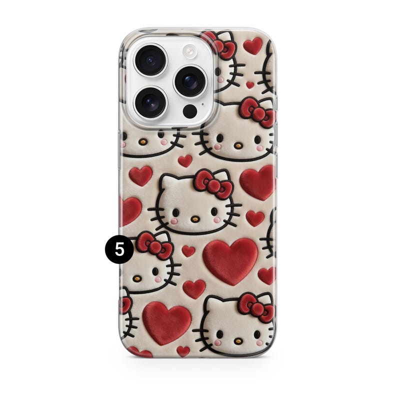 May include: A phone case featuring a repeating pattern of Hello Kitty faces with red bows and hearts. The case has a clear border and a beige background. The design includes a 3D effect, with the characters and hearts appearing raised.