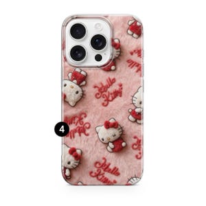 May include: A pink phone case featuring a repeating pattern of Hello Kitty characters in red and white. The case has a fuzzy texture and the words "Hello Kitty" are written in red script.