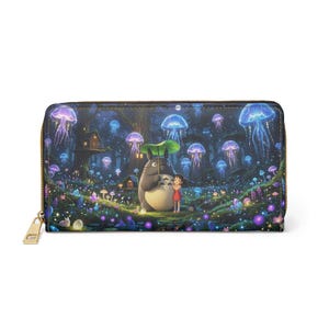May include: A zip-around wallet with a fantasy forest scene featuring glowing jellyfish, mushrooms, and a cartoon character under an umbrella. The wallet has a gold-coloured zip and a detailed, colourful design.