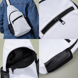 May include: White sling bag with black mesh side pocket and black zipper details. The bag has a curved design and a black interior. The strap is white with a black stripe. The bag is made of a durable material.