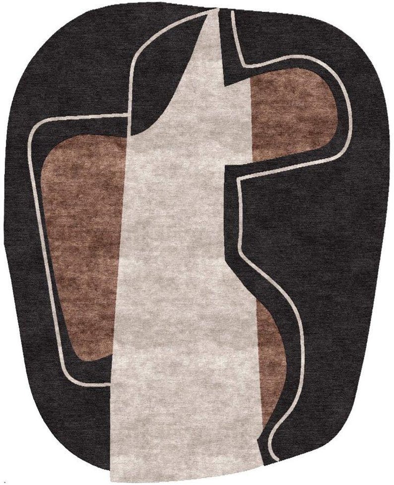 May include: Abstract area rug with a dark gray background and a geometric design in white, beige, and brown. The rug has a unique, organic shape and a modern aesthetic, suitable for living rooms or bedrooms.