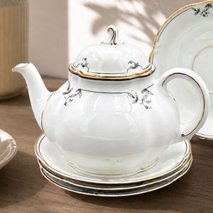 Vintage Hermann Ohme Germany porcelain teapot + 4 saucers black floral pattern and gold trim, antique Silesia tea set